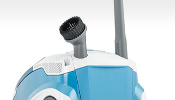 Mistral XS, small nozzles attached to the body Mistral XS, convenient slots on the vacuum cleaner body for upholstery and crevice nozzles